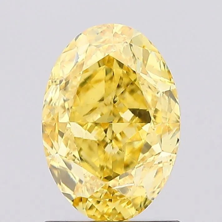 1.52ct Oval Lab Grown Diamond (Colour Fancy Vivid Yellow, Clarity SI1, IGI Certified) - The Sapphire Merchant