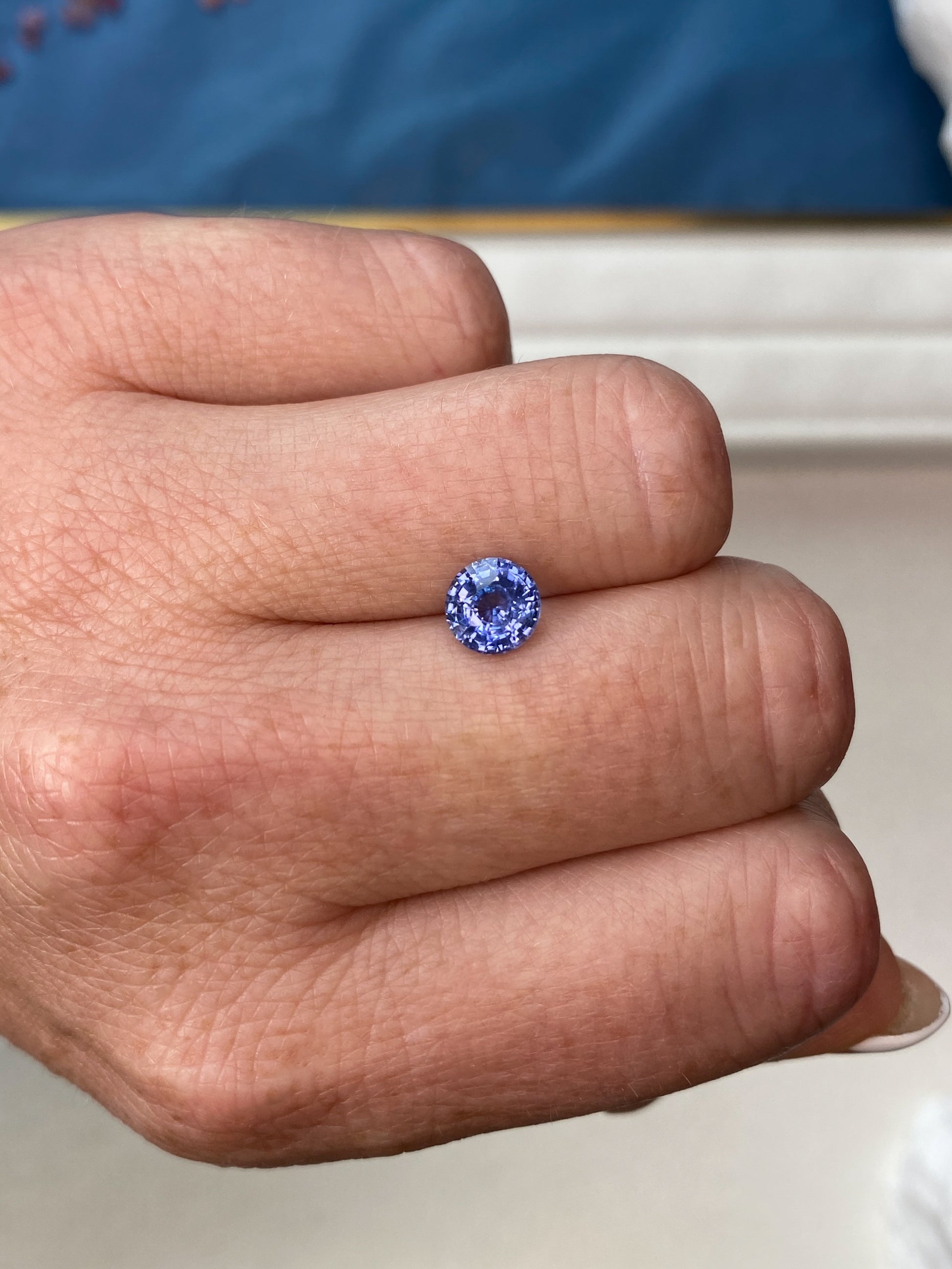 1.57ct Blue Sapphire Round Brilliant Cut On Hand
