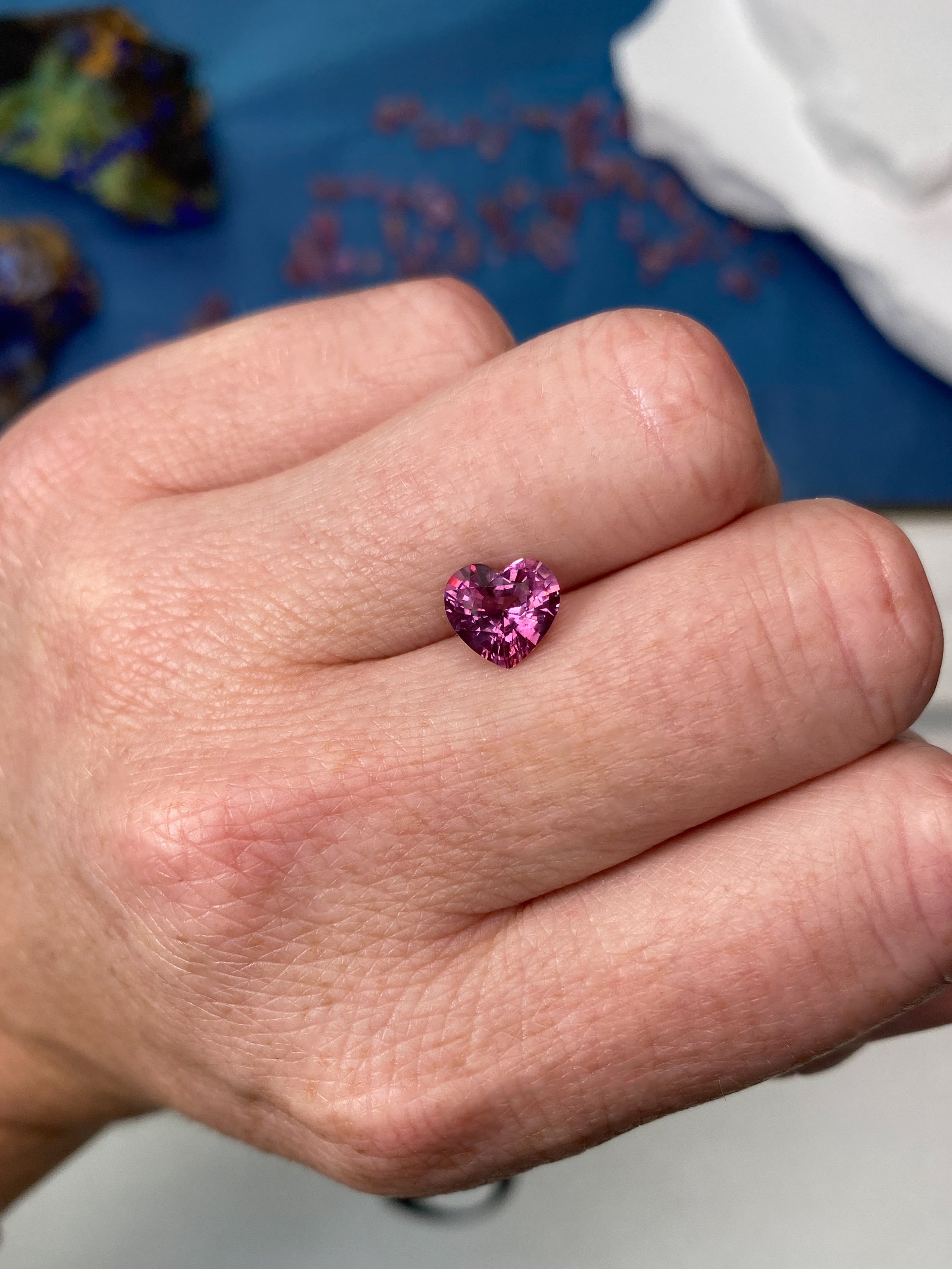 1.93ct Pink Mahenge Spinel Heart Shape Gemstone On Hand