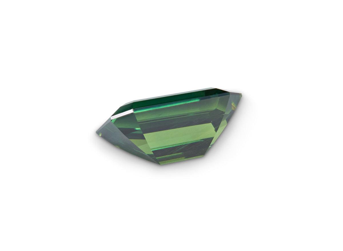 2.01ct Green Australian Sapphire Emerald cut on a white background to show clarity.