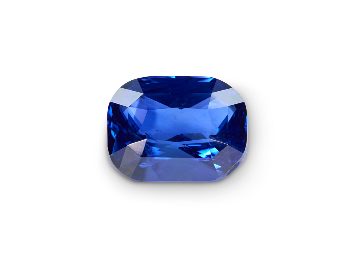 2.06ct Royal Blue Sapphire cushion cut on white background to show scale