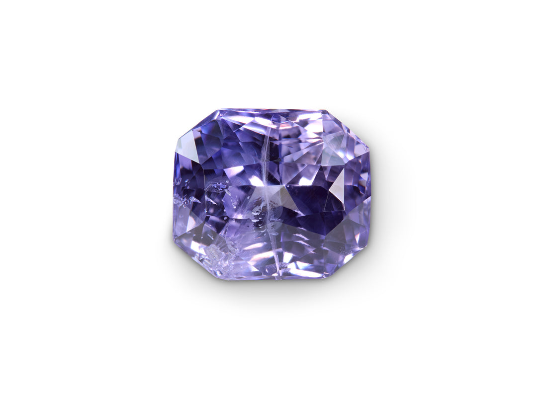 2.56ct Lavender Sapphire in a Radiant Cut on white background to show clarity. 