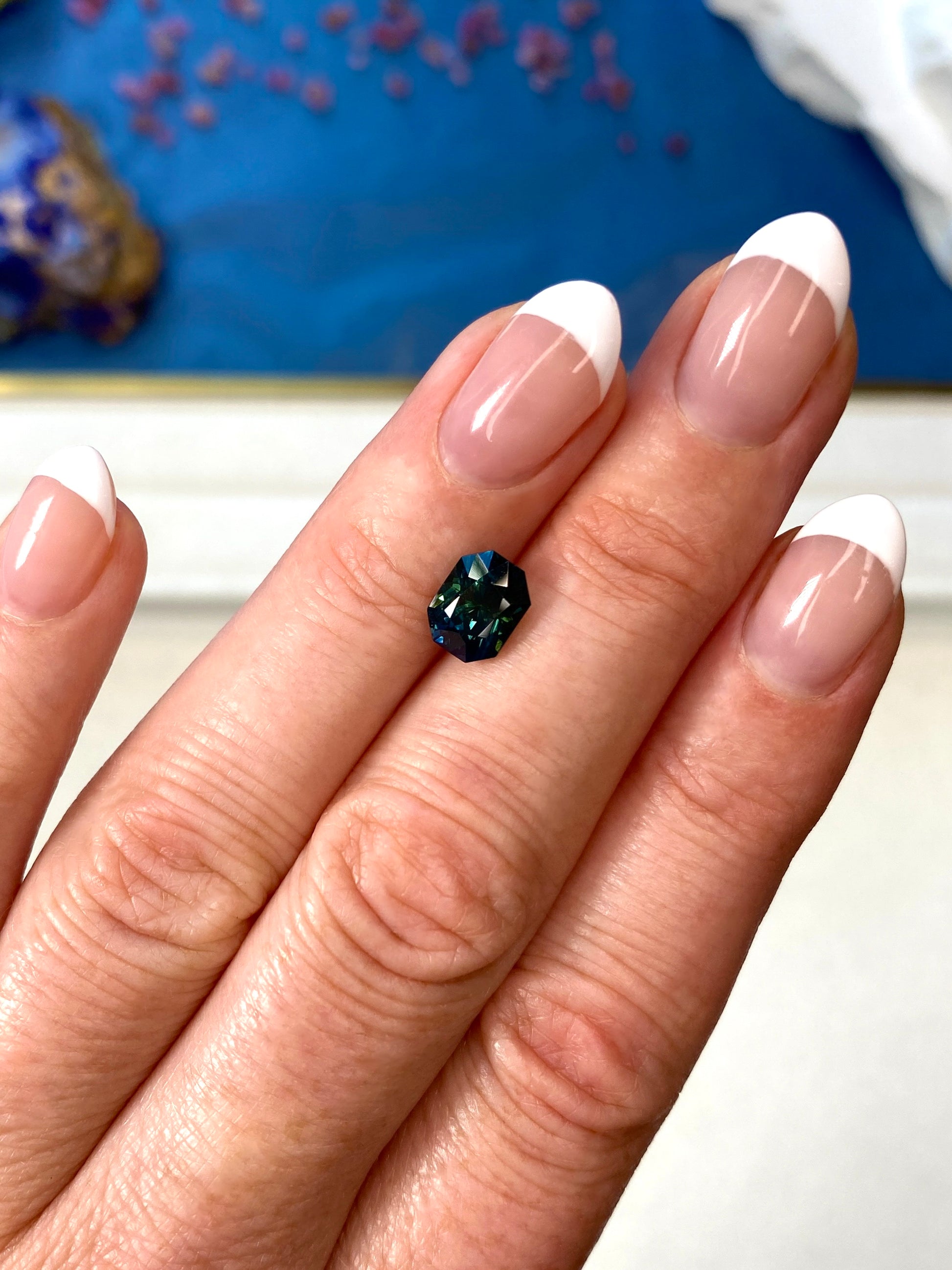 2.57ct Teal Sapphire Radiant Cut On Hand